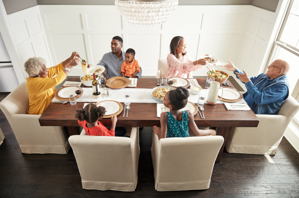 Family having breakfast at the dining table | Green's Floors & More