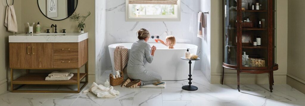 Kid enjoying bath | Green's Floors & More